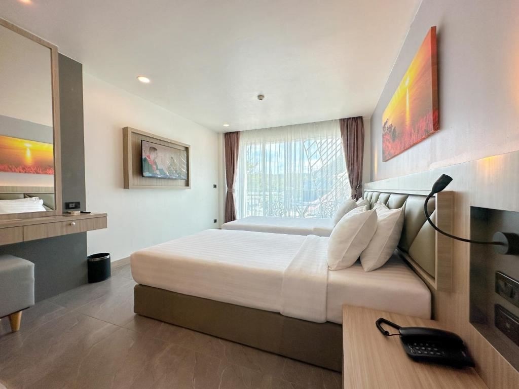 rooms-deluxe-twin-balcony-mountain-view