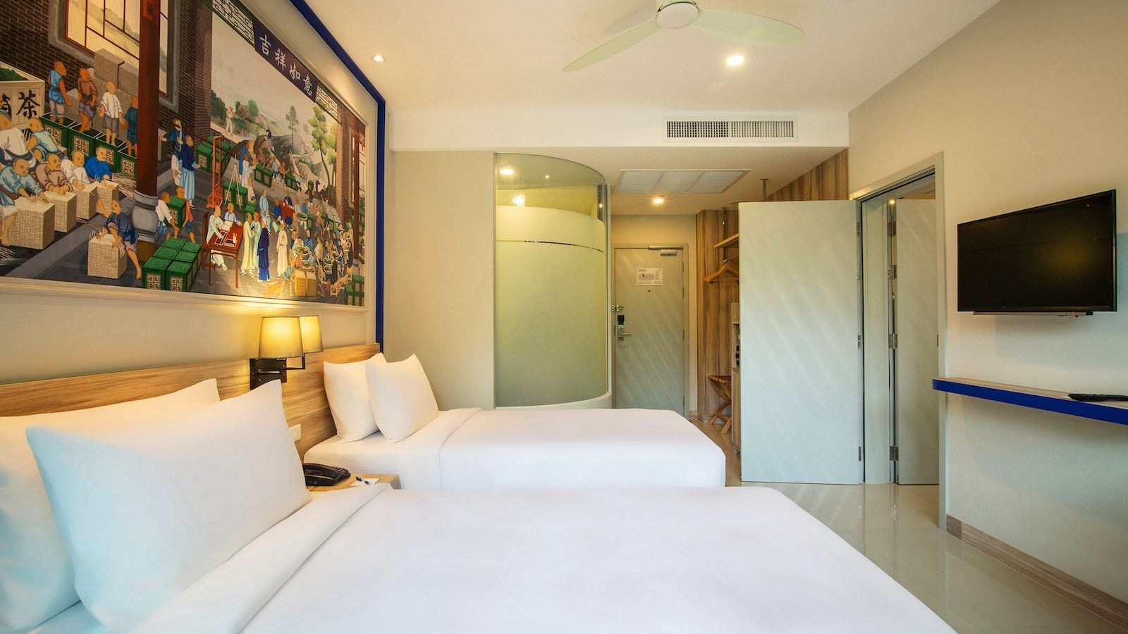 rooms-two-bedroom-family-pool-view-suite-child-sharing-bed
