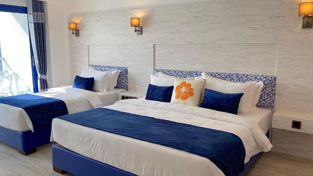 rooms-deluxe-family-room-city-view-with-balcony