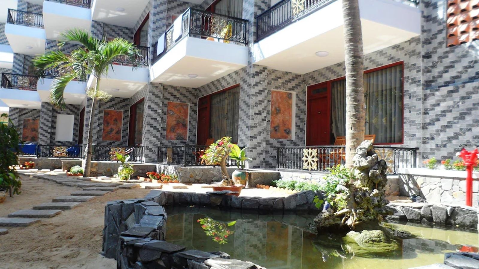 rooms-room-deluxe-ocean-or-garden-view-balcony-child-without-extra-bed