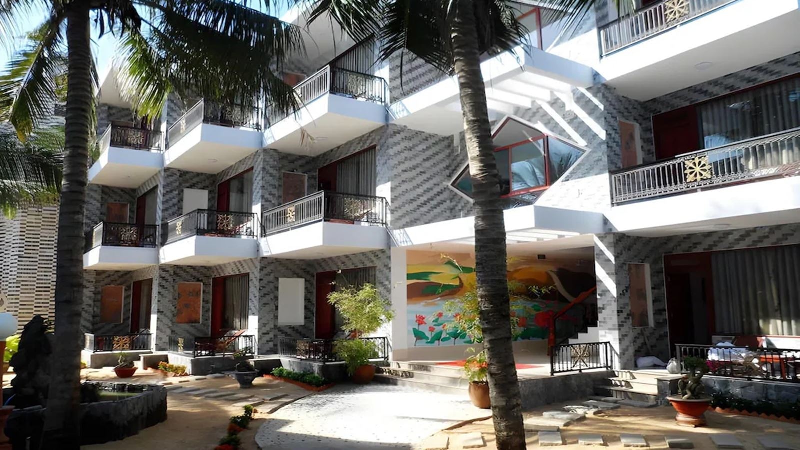 rooms-room-deluxe-ocean-or-garden-view-balcony-child-without-extra-bed