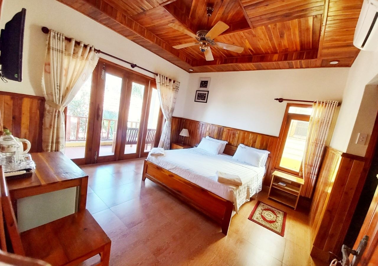 rooms-deluxe-double-roh-garden-view-with-balcony-child-without-extra-bed