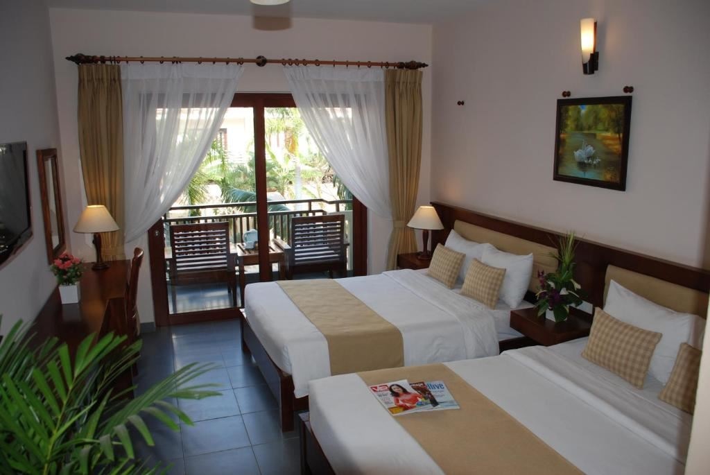 rooms-deluxe-garden-view-balcony