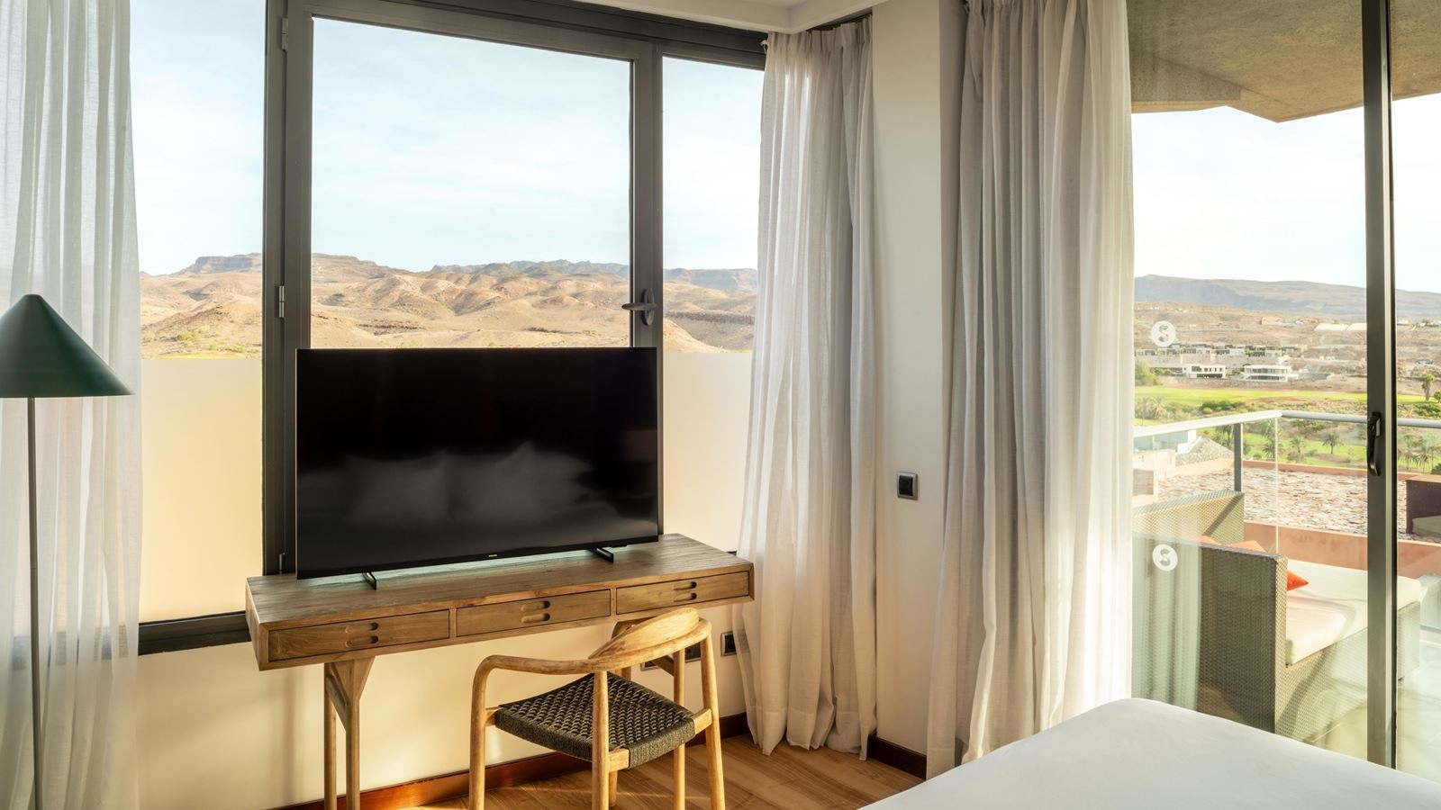 rooms-deluxe-suite-with-mountaingolf-view-balcony-or-terrace