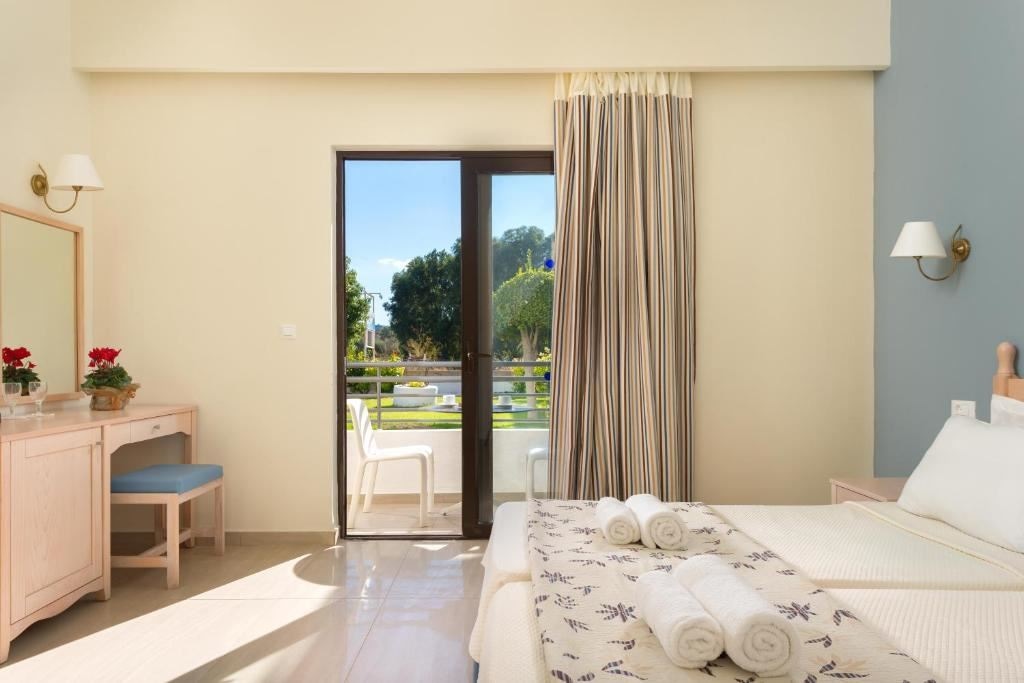 rooms-double-room-garden-view-with-balcony