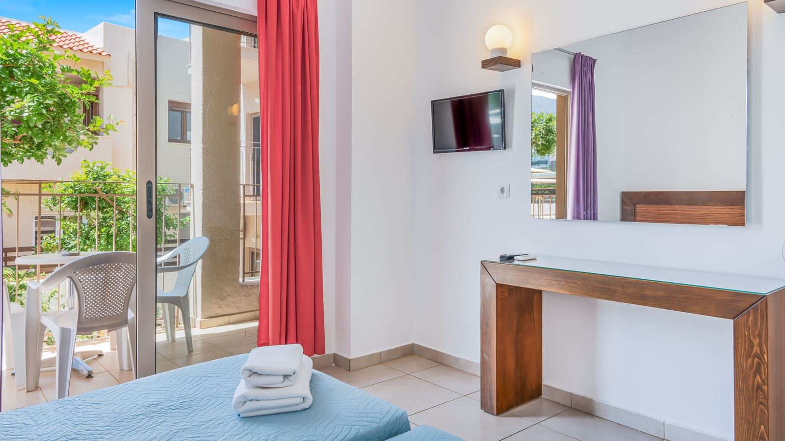 rooms-standard-1-bedroom-triple-apartment-balcony-or-terrace