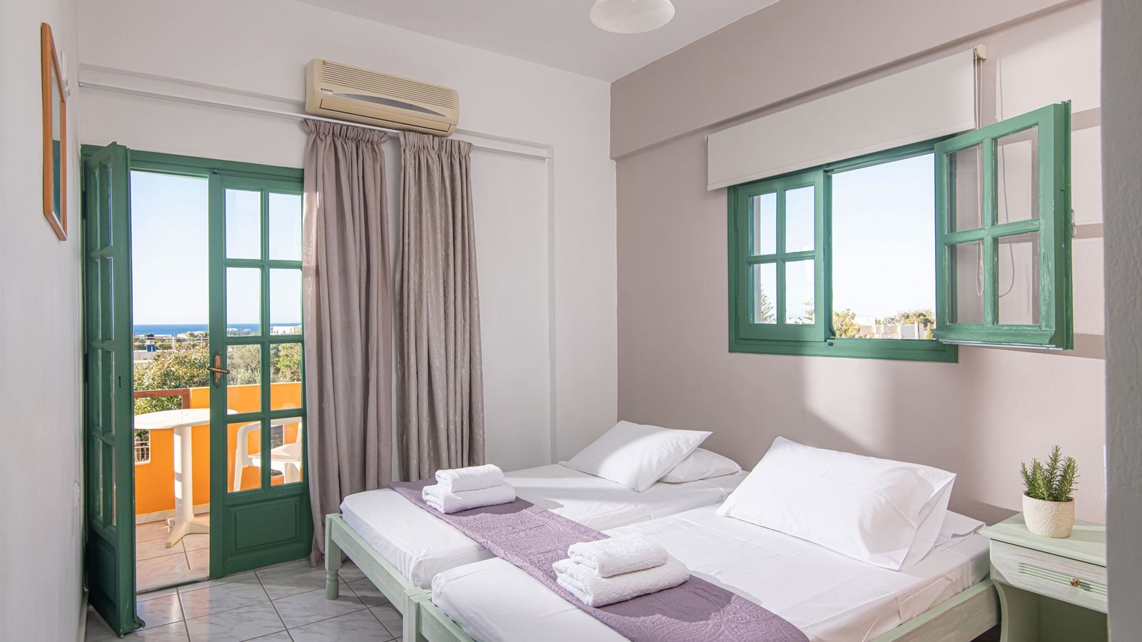 rooms-triple-one-bedroom-apartment-with-garden-or-pool-view