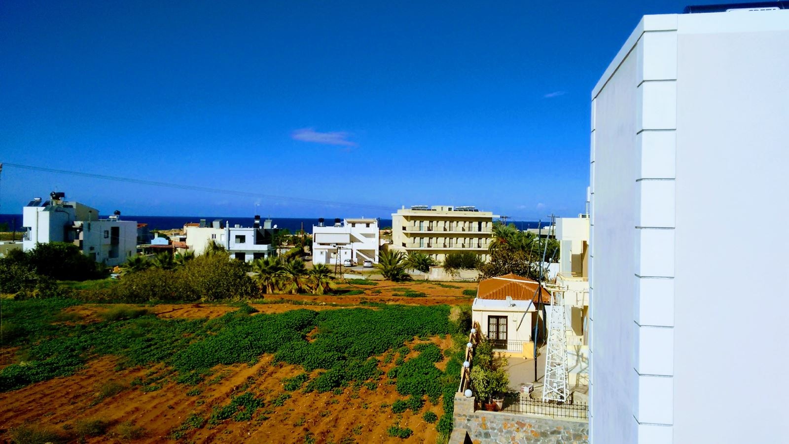 rooms-superior-1-bedroom-apartment-side-sea-view-or-pool-view-balcony-or-terrace