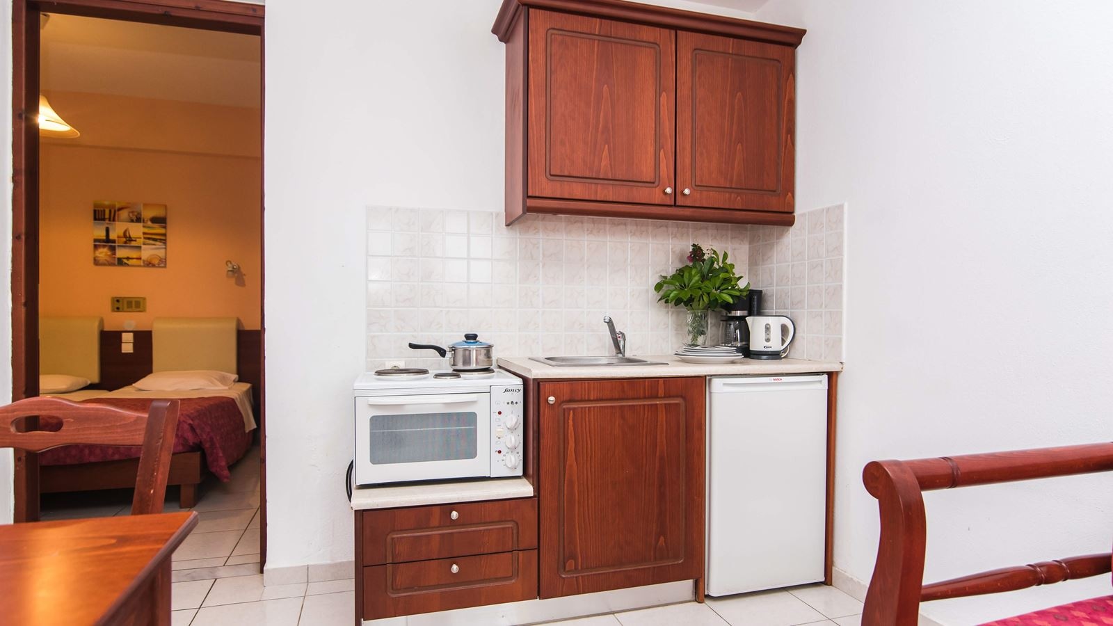 rooms-one-bedroom-apartment-garden-view-or-side-sea-view-4-pax