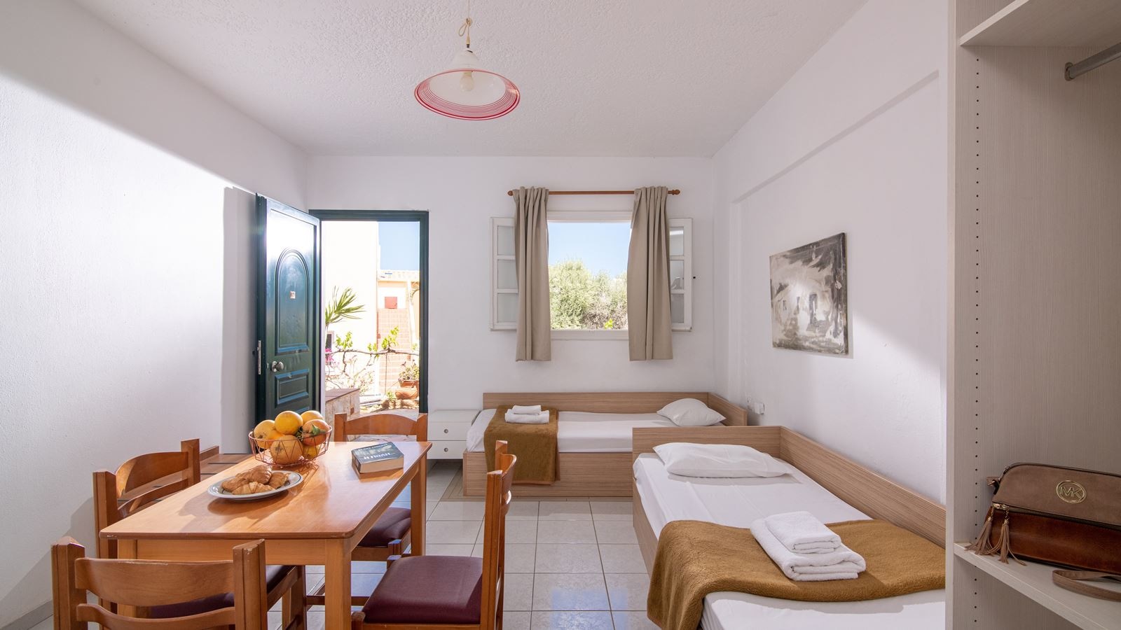 rooms-one-bedroom-apartment-with-garden-or-pool-view