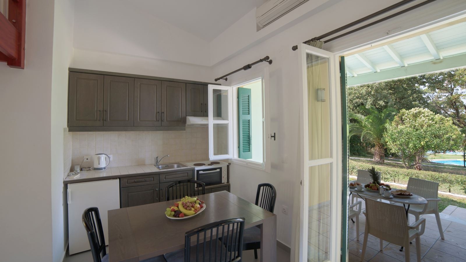 rooms-two-bedroom-family-superior-pool-view-balcony-or-terrace