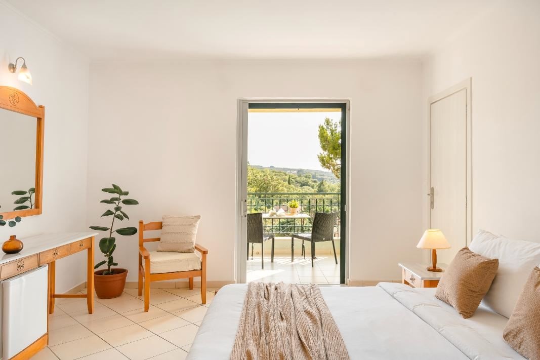 rooms-double-or-twin-room-garden-view-balcony-or-terrace