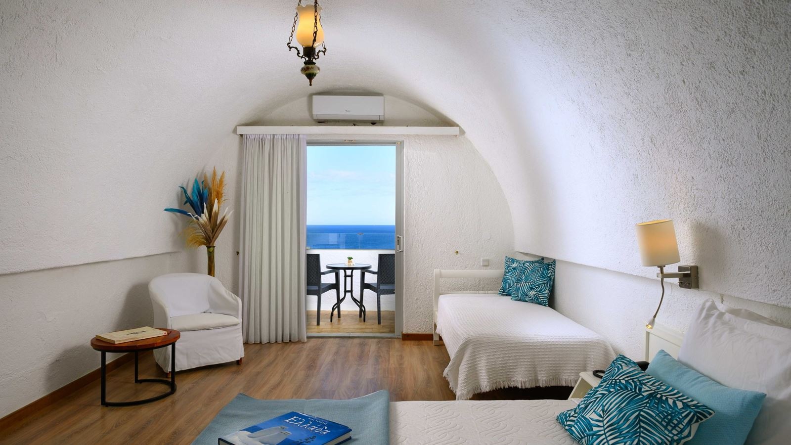 rooms-classic-triple-room-seaview-balcony-or-terrace