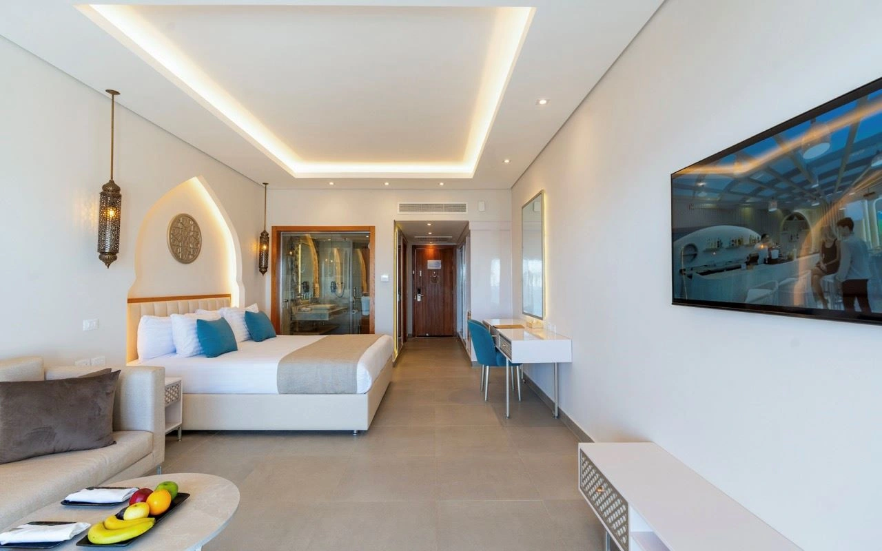 rooms-junior-suite-garden--pool--partial-sea--sea-view--sea-front