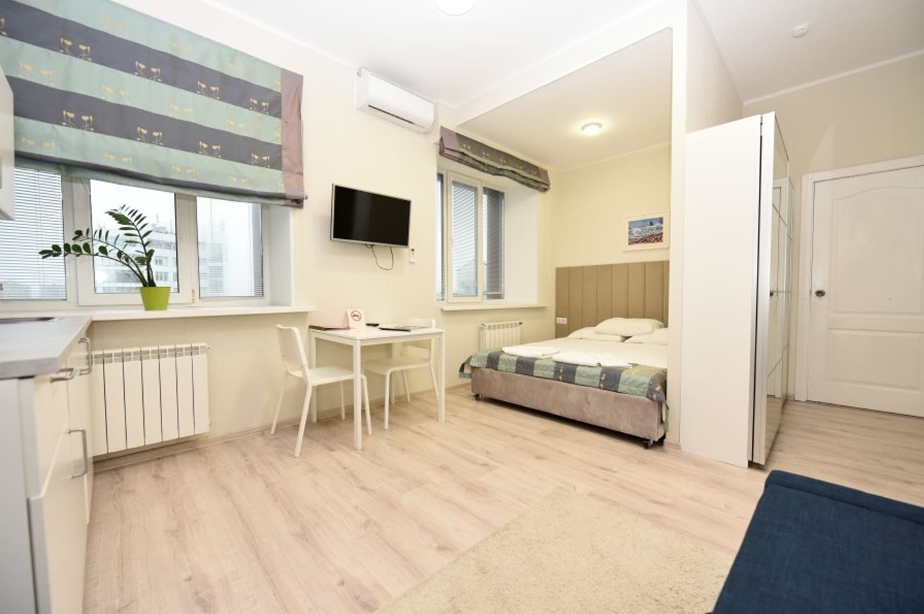 rooms-номерстудио-с-видом-на-город-двуспальная-кровать