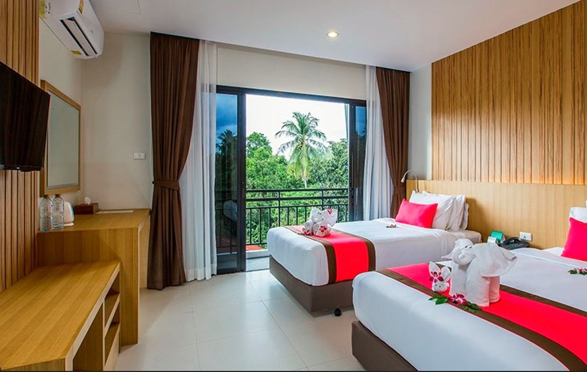 rooms-tropical-deluxe-child-sharing-bed
