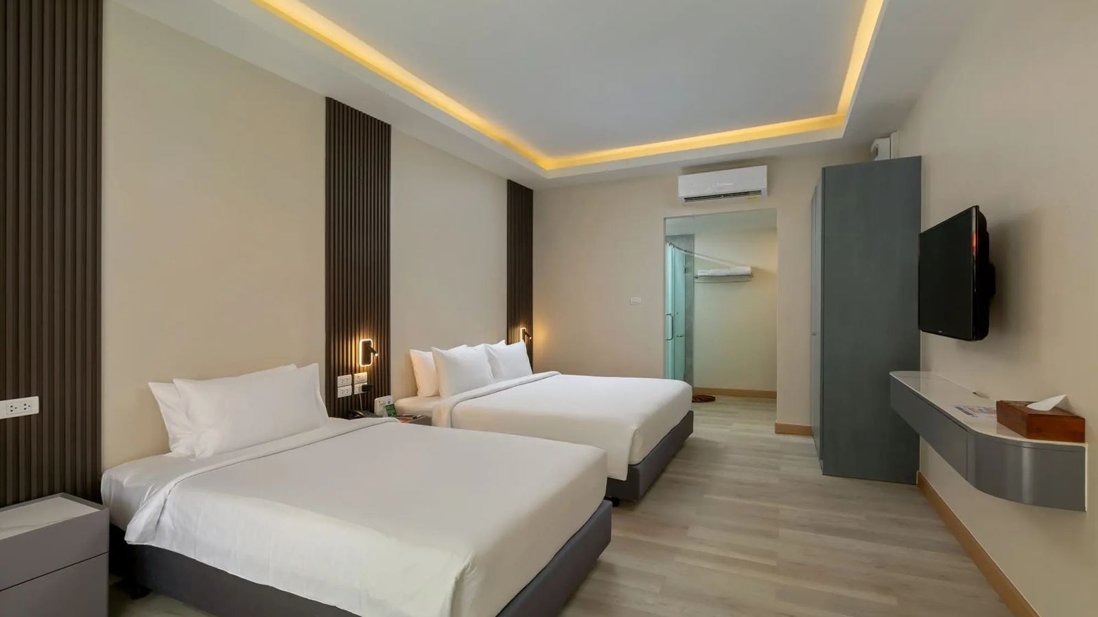 rooms-tropical-wing-child-sharing-bed