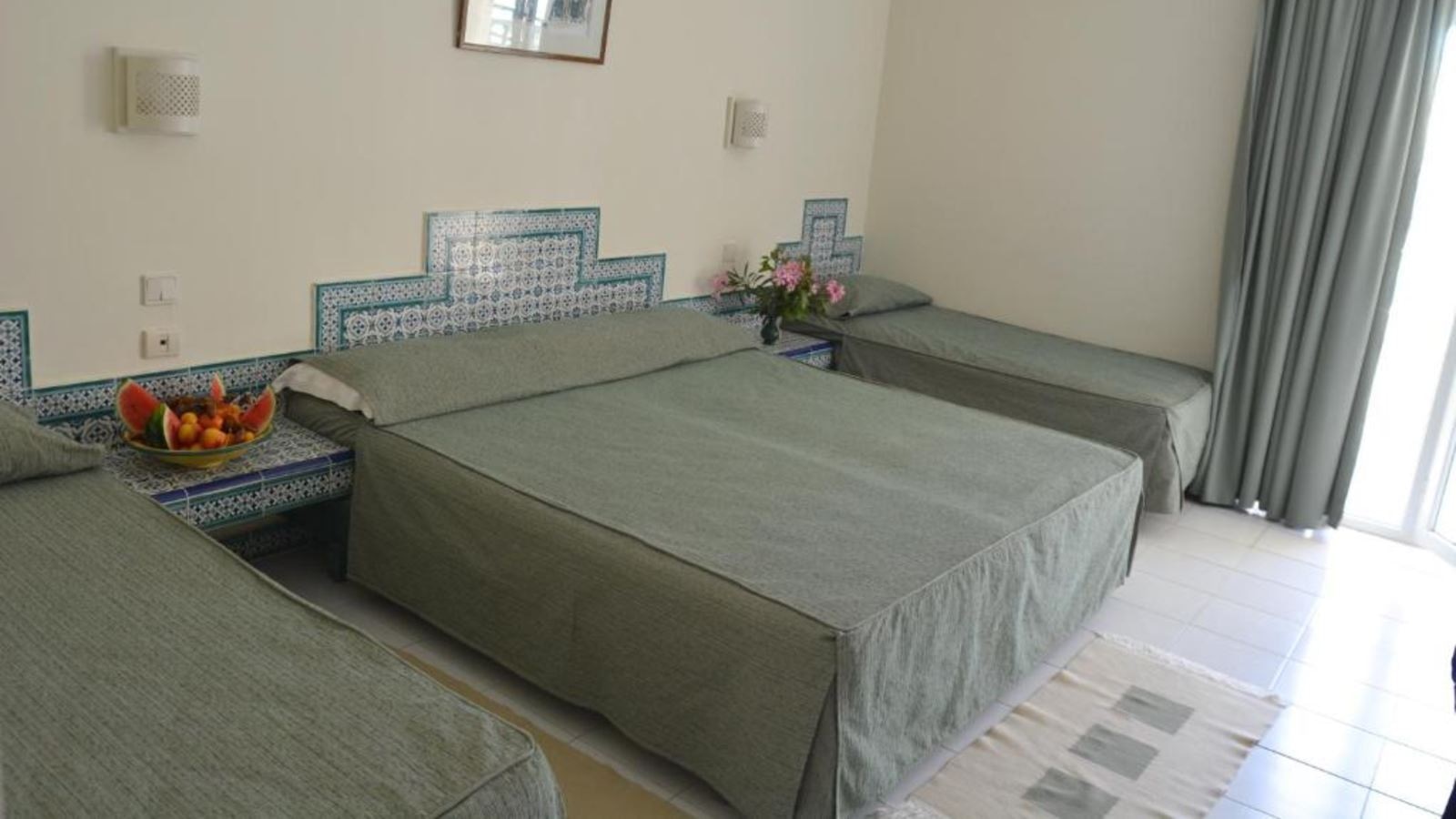 rooms-quadruple-room-garden-view